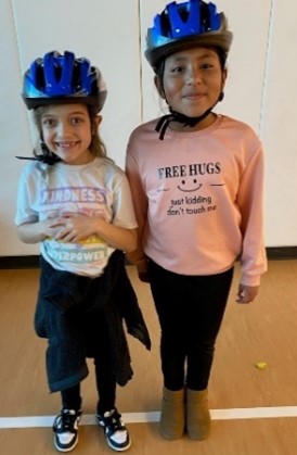 Children wearing bicycle helmets